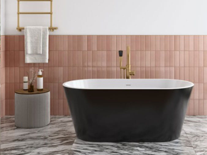 Free standing bathtub with white interior and black exterior