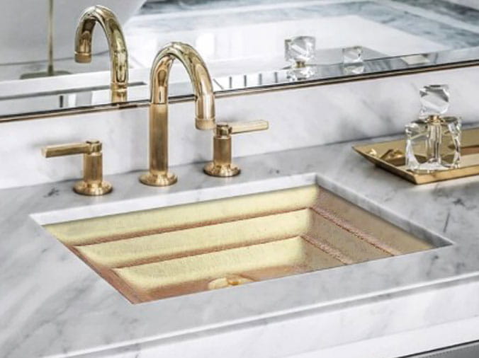 Bathroom sink with brass faucet